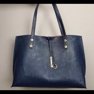 Gorgeous Calvin Klein reversal leather tote.